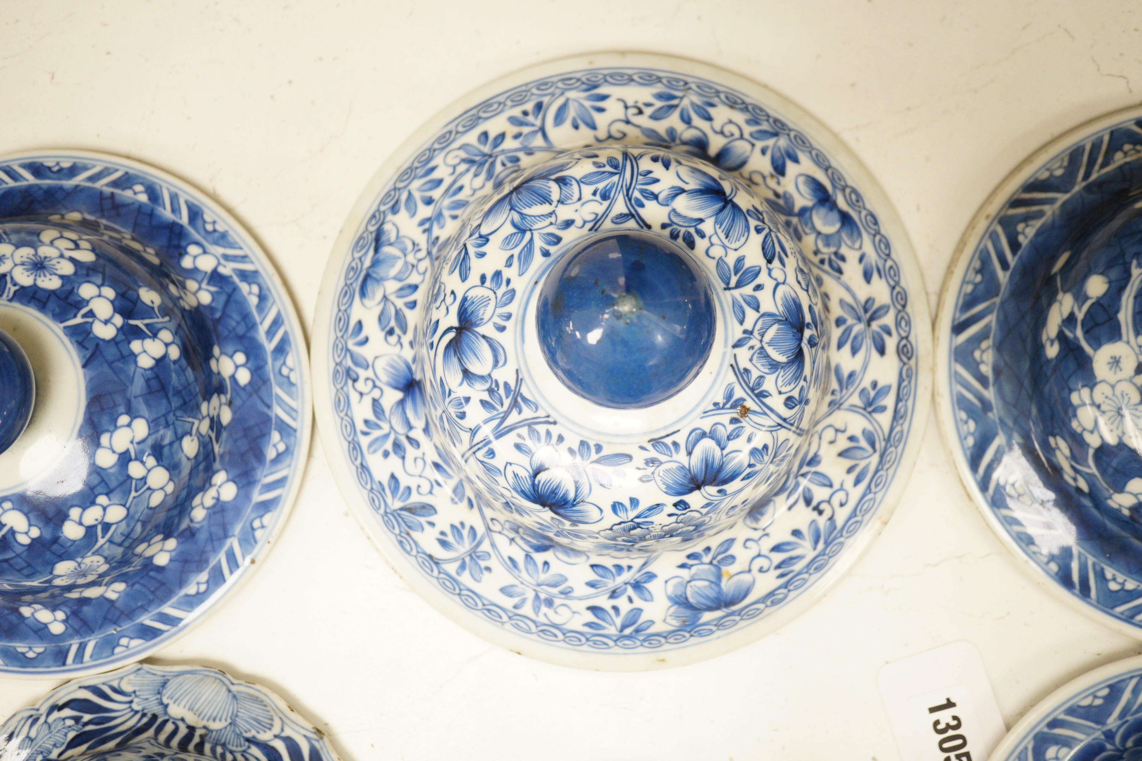 Six Chinese Kangxi blue and white vases and jar covers, largest 21.5cm diameter., Provenance - D.C.Monk & Son, former dealers based in Kensington Church Street, London W8